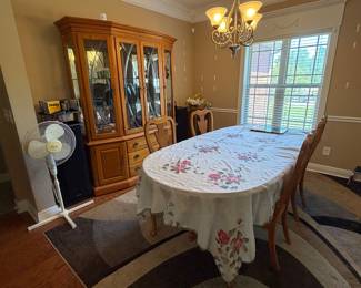 Thomasville Solid Oak dining table and china cabinet