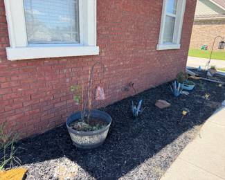 Outdoor pots and plants and yard decor