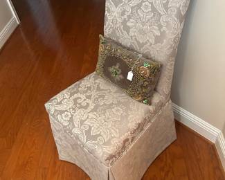 Parson's chair with a decorative pillow