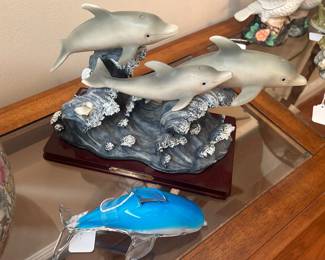 Glass dolphins similar to Murano glass