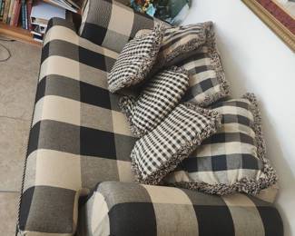 Matching black and white loveseat