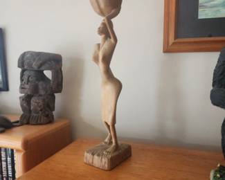 Woman carrying water on head statute