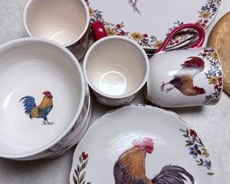 Rooster Dinnerware Collection – Coordinating rooster-themed dinnerware including dinner plates, salad plates, bowls, mugs, and serving pieces with colorful floral borders. A charming collection for everyday use or farmhouse-style décor. Items sold individually unless noted.