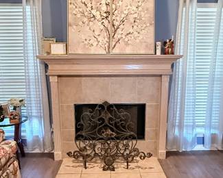 Decorative fireplace screen, wood mantel, two-piece floral canvas wall art, and coordinating home décor. A beautiful collection for enhancing a living room or family room. Items sold individually unless noted.