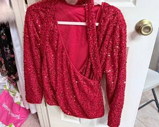 Vintage Sequin Evening Top – Long sleeve wrap-style evening top fully embellished with red sequins. A bold statement piece for holiday parties, special occasions, or vintage-inspired fashion. Sold as found.