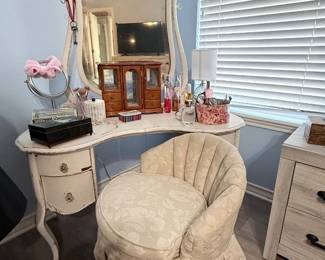 Vintage Vanity Set – Elegant vanity featuring a decorative framed mirror, curved drawers, and a marble-look top, paired with a upholstered vanity chair. A beautiful addition to a bedroom or dressing area with classic vintage-inspired style. Items sold individually unless noted.