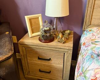 Bedroom Accent Collection – Two-drawer nightstand, glass table lamp, decorative cloche, framed photo frame, and bird figurines. A coordinated collection of functional furniture and decorative accents. Items sold individually unless noted.