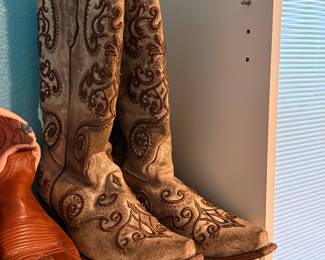 Corral Embroidered Western Boots – Pair of Corral tall leather Western boots featuring decorative embroidered scrollwork and a distressed tan finish. A stylish pair for everyday wear, country concerts, rodeos, or Western fashion. Sold as found.