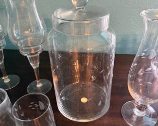 **Princess House Crystal Canister** – Princess House crystal canister with matching lid, featuring an etched floral pattern and knob handle. Perfect for storing cookies, candy, or kitchen staples, or displaying as part of a Princess House collection. Sold as found.