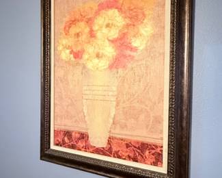 framed floral print featuring a bouquet of flowers in a decorative vase with warm neutral tones. A classic wall accent for a living room, dining room, bedroom, or hallway. Sold as found.