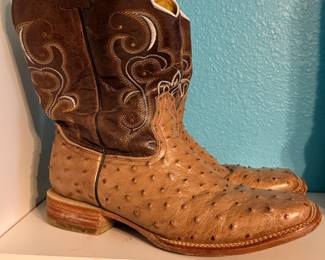 Ostrich Leather Western Boots – Pair of Western boots featuring genuine ostrich leather foot, brown leather shaft, and decorative embroidered stitching. A classic pair of cowboy boots suitable for everyday wear, ranch work, or Western fashion. Sold as found.