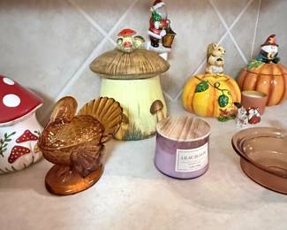 Kitchen Décor Collection – Decorative ceramic mushroom cookie jar, turkey candy dish, pumpkin candle holders, seasonal figurines, candle, baking dish, and assorted fall and holiday décor. Items sold individually unless noted.
