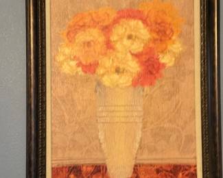 framed floral print featuring a bouquet of flowers in a decorative vase with warm neutral tones. A classic wall accent for a living room, dining room, bedroom, or hallway. Sold as found.