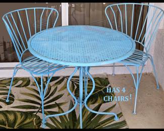 Metal Lanai Table and 4 Chairs Showing 2 Chairs
