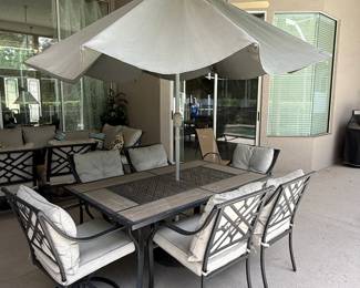 Table and chairs have sold, umbrella and stand are still available