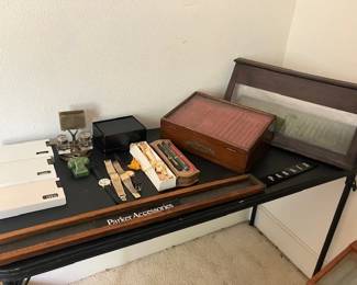 Pens, watches, display cases