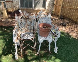 Iron chairs, part of a bench
