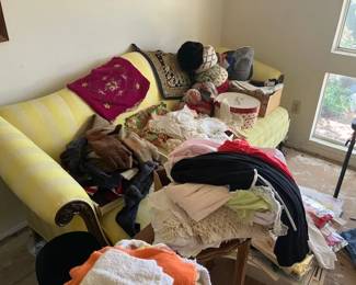 Sofa, hats, hat boxes, vintage clothing