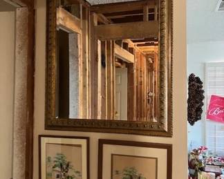 Beveled mirror, dog pictures