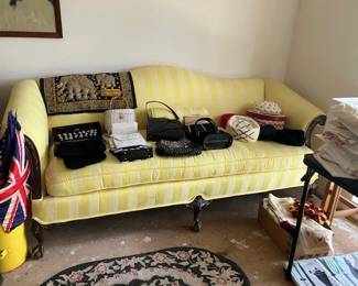 Nice yellow period sofa, vintage handbags, linens