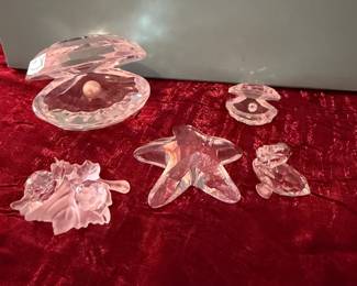 #179 - $60 - Swarovski 2 snails - star fish - 2 clams and a mini pelican