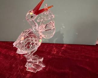 #194 - $70 - Swarovski Stork with baby hanging from bill