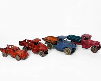 (4) Antique Cast Iron Trucks (G)