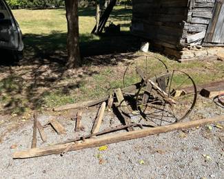 Antique seeder in parts