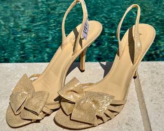$50 - Kate Spade bow slingback, size 8.5. Minor marks on left bow, as shown.