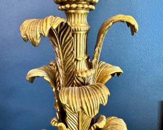 Up close detail of the beautiful gold tiered palm-like leaf design of the Visual Comfort Alberto table lamps.