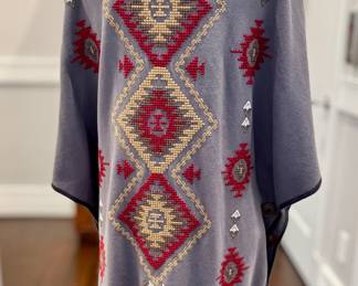 SOLD-Back image of the JW cardigan.
