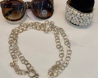 ($24 - polycarbon sunglasses with tortoise shell frames, brand new!) ($46 - silver necklace with stone, 44 inches) ($10 - oyster pearl cuff braclet)