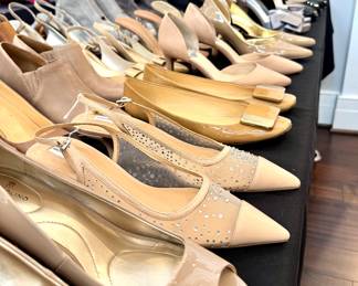 Rows and rows of designer shoes in great condition!