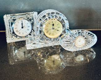 Left to right: ($60 - Waterford crystal Metropolitan square desk clock, 4.5 x 3.5) ($60 - Waterford crystal Lismore Diamond desk clock, 7 x 4.5) ($40 - Waterford crystal small oval desk clock, 5 x 2)