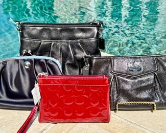 Left to right ($22 - Coach black clutch 8") ($60 - Coach black soho swing bag 9") ($30 - Coach red wristlet 6.5") ($60 Coach clutch with wallet 9")