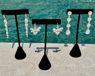 Left to right ($85 - Nadri earrings) ($30 Bee earrings) ($28 - Crystal earrings)