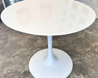 $300 - Round lacquered tulip table, 32" D x 29H. Excellent quality, heavy and sturdy.