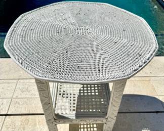 $150 - Round wicker end table, some weathering noted. 27D x 27.5H