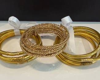 left to right ($70 - Budah Girl gold bracelets) ($18 - gold toned wired bracelet) ($70 - Budahgirl gold bracelets)