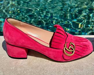 $300 - Hot pink Gucci suede pumps with Marmont fringe, size 38. Minor wear on the heel noted.