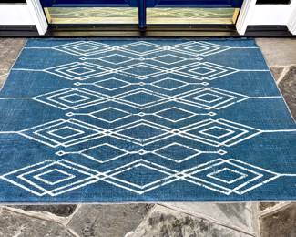 $200 - Ruggable royal blue outdoor rug - 5 x 7