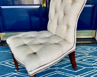 $80 - Beige button-tufted upholstered accent chair, 22L x 22W x 40H - a few small spots on the seat area.