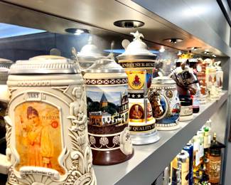 Large collection of beer steins including Anheiser Bush Collectors Club Membership steins, Heritage Series, Harley Davidson "Holiday Memories" Collection and MORE! Make an appointment to purchase your favorite!