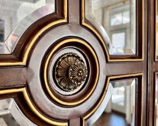Up-close of the antiqued mirror and rosette details