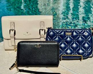 Left to right ($74 - Kate Spade cream leather crossbody/clutch 9.5") ($100 - Kate Spade black wristlet/wallet new w/ tag 7") ($28 - Kate Spade blue wristlet 8")