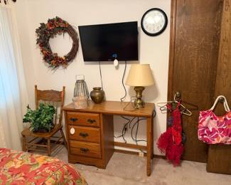 desk, chair, clock, lamp, child costumes, TV, decor