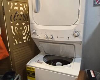 GE . cu. ft. Top Load Washer and Electric . cu. ft. Dryer Laundry Center