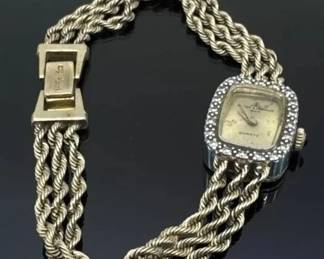 BM 14k gold watch