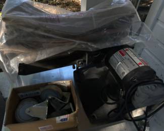 Large belt sander with life supply of belts