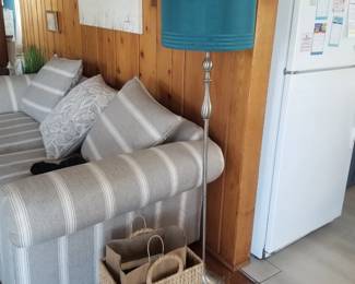 Floor lamp; magazine basket